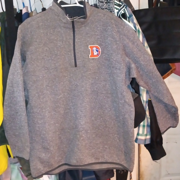 NFL Denver broncos sweater.Got as a gag gift.Still has tags and never worn.